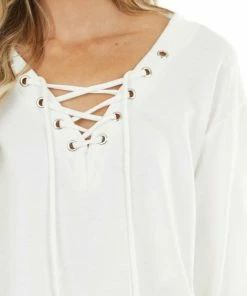 BiBi Tops Ivory Long Sleeve Knit Top With Lace Up V Neck Detail