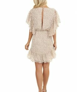 BiBi Dresses Ivory Printed Surplice Dress With Ruffle Sleeves And Hemline
