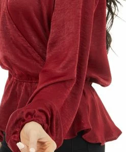 Caramela Burgundy Satin Surplice Blouse With Elastic Ruffle Hemline 29 Caramela Burgundy Satin Surplice Blouse With Elastic Ruffle Hemline