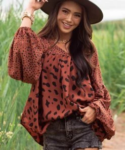 Hailey & Co Tops Cinnamon Leopard Print Babydoll V Neck Blouse