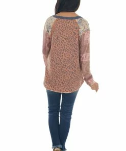 Easel Tops Rust Multiprint Knit Top With Raw Edge Detail