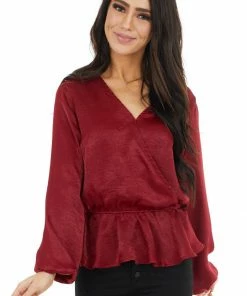 Caramela Burgundy Satin Surplice Blouse With Elastic Ruffle Hemline 23 Caramela Burgundy Satin Surplice Blouse With Elastic Ruffle Hemline