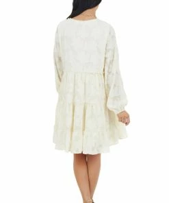 Peach Love Cream Textured Print Tiered Babydoll Dress With Long Sleeves Dresses