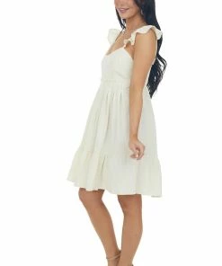 Umgee Dresses Rich Cream Babydoll Tiered Sleeveless Dress