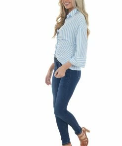 Umgee Tops Baby Blue And Ivory Striped Half Button Top 14 Umgee Tops Baby Blue And Ivory Striped Half Button Top