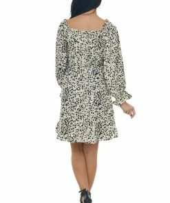 Jodifl Dresses Vanilla Cheetah Smocked Off Shoulder Dress