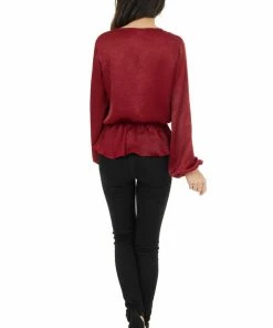 Caramela Burgundy Satin Surplice Blouse With Elastic Ruffle Hemline 24 Caramela Burgundy Satin Surplice Blouse With Elastic Ruffle Hemline