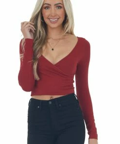 Nikibiki Cranberry Ribbed Long Sleeve Surplice Crop Top Tops