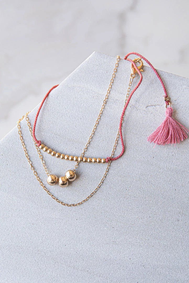 WALL TO WALL Gold And Berry Beaded Layered Bracelet With Tassel Details Accessories 5 WALL TO WALL Gold And Berry Beaded Layered Bracelet With Tassel Details Accessories