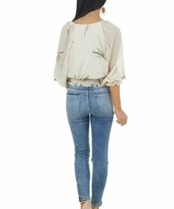 Lush Clothing Vanilla Woven Surplice Top With Abstract Leaf Details 24 Lush Clothing Vanilla Woven Surplice Top With Abstract Leaf Details