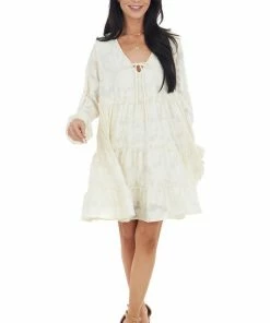 Peach Love Cream Textured Print Tiered Babydoll Dress With Long Sleeves Dresses