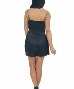 NAKED ZEBRA Dresses Black Cheetah Print Smocked Back Silky Romper