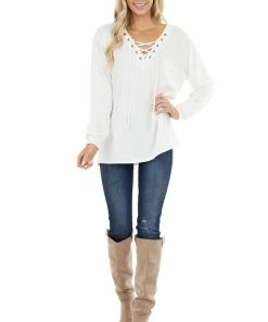 BiBi Tops Ivory Long Sleeve Knit Top With Lace Up V Neck Detail