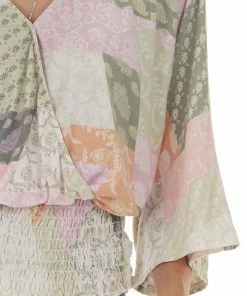 143 Story Pink Printed Long Sleeve Surplice Knit Top Tops