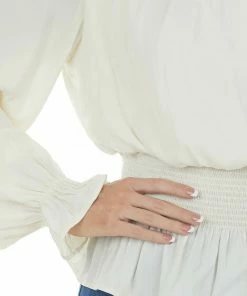 She + Sky Cream Smocked Waist Bubble Sleeve Peplum Top