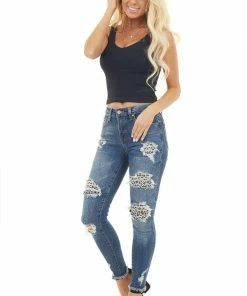 C'est Toi Bottoms Dark Wash Denim Skinny Jeans With Distressed Leopard Print