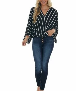 Andree Black And Ivory Striped Surplice Neck Blouse