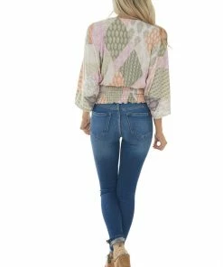 143 Story Pink Printed Long Sleeve Surplice Knit Top Tops
