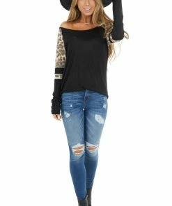 HEIMISH Black Stretchy Knit Top With Raglan Leopard Print Sleeves
