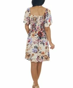 ANGIE Champagne Floral Print Smocked Short Dress