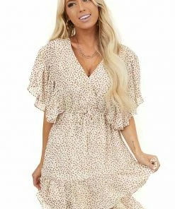 BiBi Dresses Ivory Printed Surplice Dress With Ruffle Sleeves And Hemline
