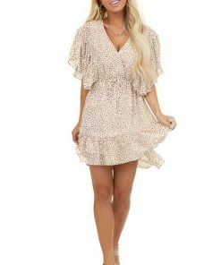 BiBi Dresses Ivory Printed Surplice Dress With Ruffle Sleeves And Hemline