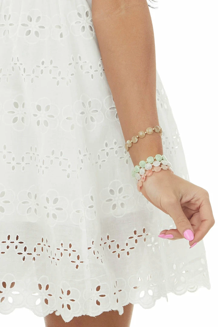 Sweet Lemon Dresses Ivory Strapless Smocked Eyelet Lace Mini Dress 8 Sweet Lemon Dresses Ivory Strapless Smocked Eyelet Lace Mini Dress