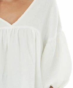 Ces Femme Ivory Textured V Neck Babydoll Top Blouses