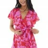 Do + Be Orchid And Ruby Large Floral Print Ruffled Open Back Romper 1 Do + Be Orchid And Ruby Large Floral Print Ruffled Open Back Romper