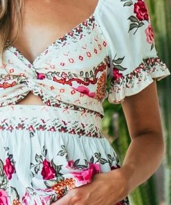 ANGIE Pastel Blue Floral Print Twist Front Peplum Blouse Tops