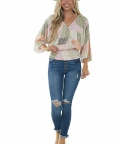 143 Story Pink Printed Long Sleeve Surplice Knit Top Tops