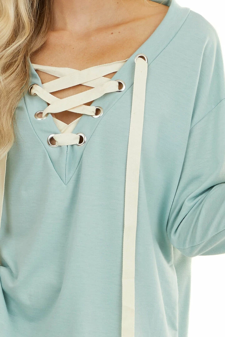 BiBi Seafoam Long Sleeve Top With Lace Up Deep V Neckline Tops 10 BiBi Seafoam Long Sleeve Top With Lace Up Deep V Neckline Tops