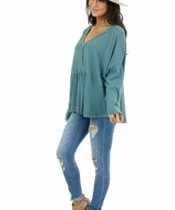 Umgee Tops Teal Blue Long Sleeve Babydoll Top With Frayed Hemline