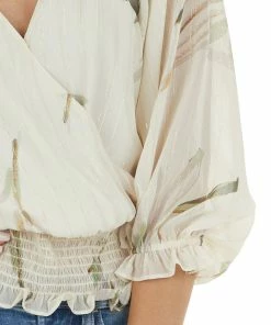 Lush Clothing Vanilla Woven Surplice Top With Abstract Leaf Details 22 Lush Clothing Vanilla Woven Surplice Top With Abstract Leaf Details