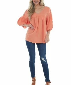 Ces Femme Vivid Salmon Textured V Neck Babydoll Top